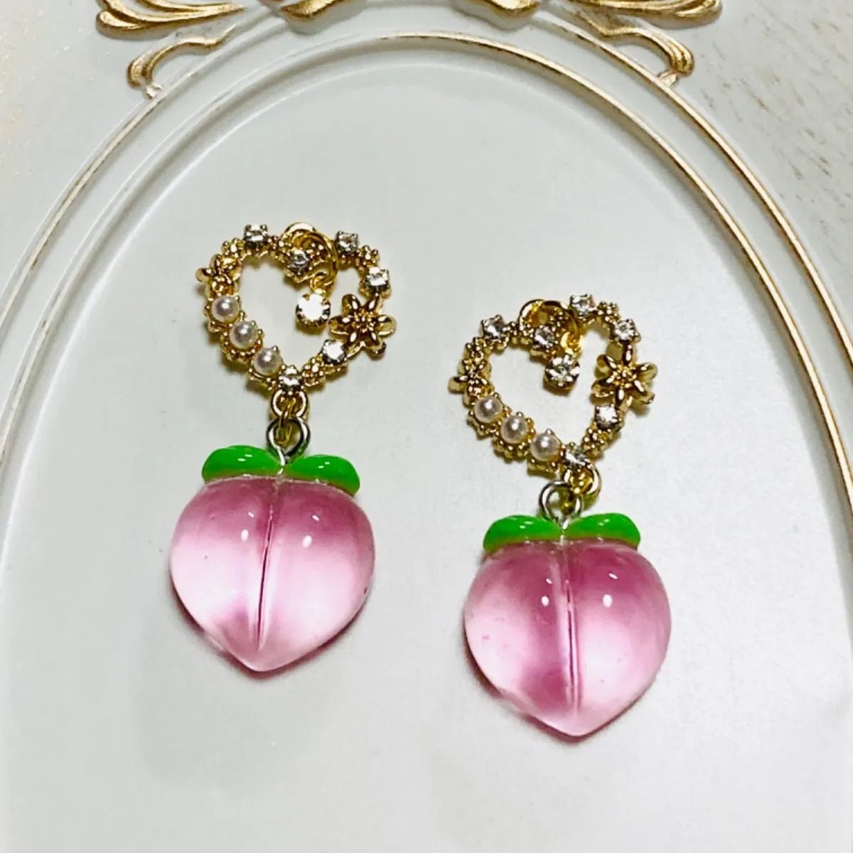 ハンドメイド キラキラストーンハート&ハート型もも〈ピアス 