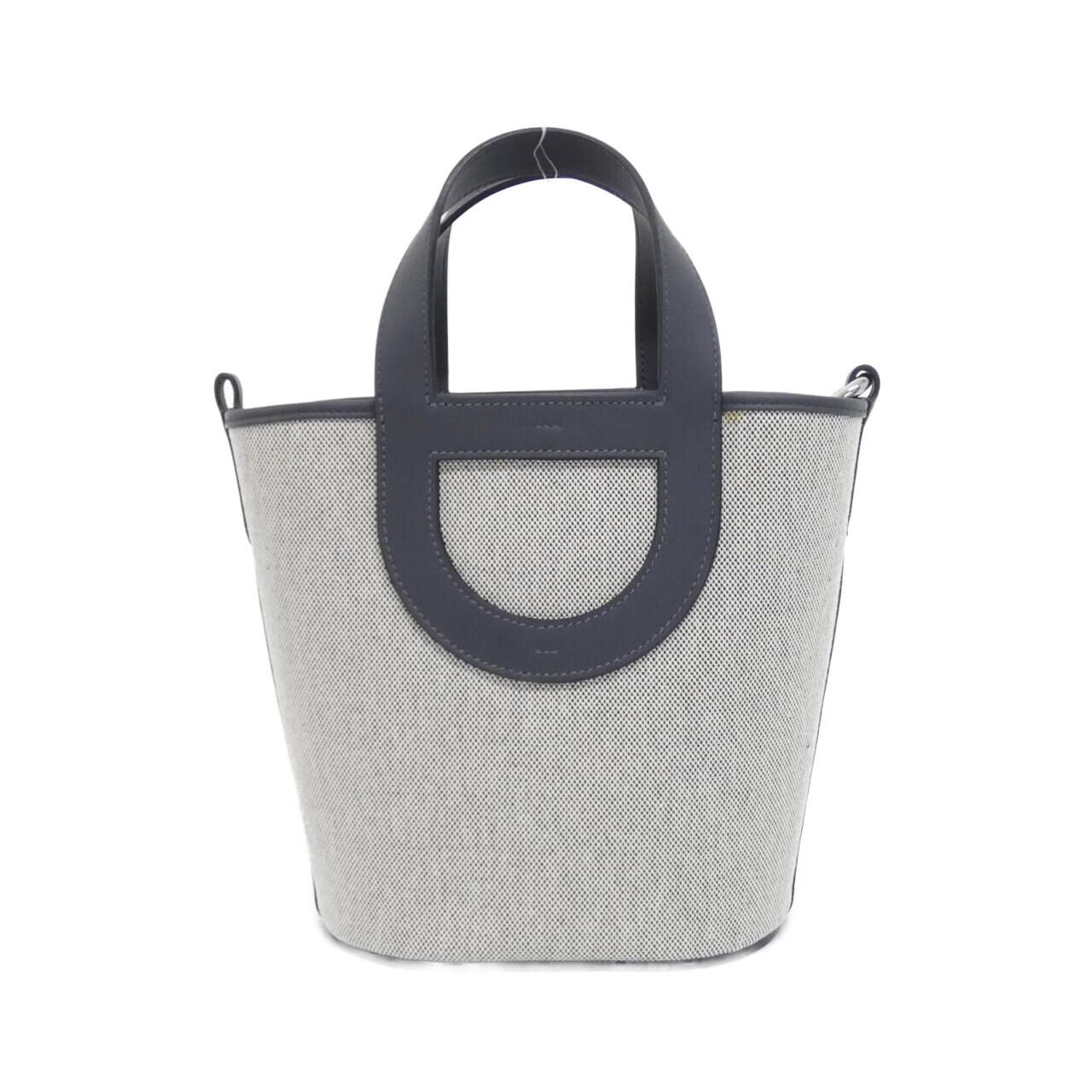 ミナペルホネン タンバリン生地のタッセル付きがま口ポーチ | Pay ID