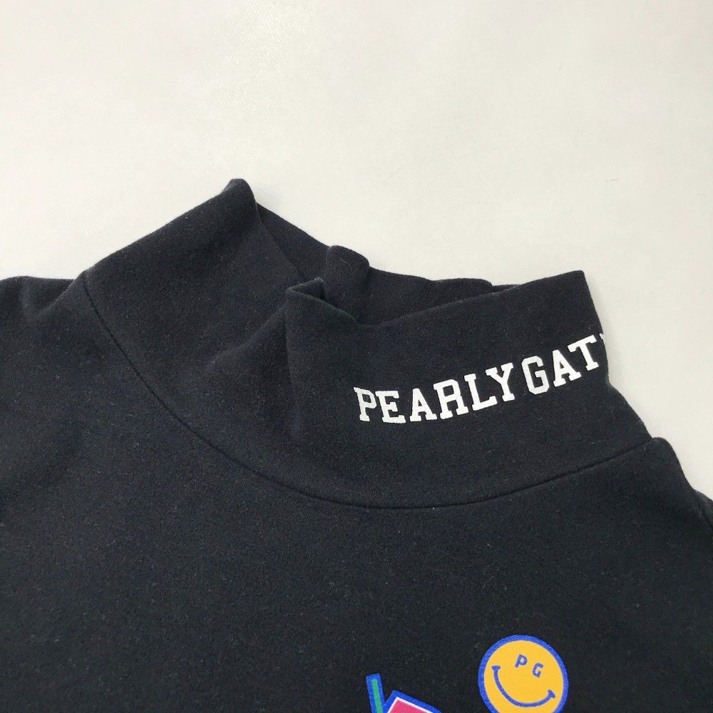 サイズ：1 PEARLY GATES パーリーゲイツ 2024年モデル ニコちゃん ハイネック長袖Tシャツ  ブラック系 [240101416182] ゴルフウェア レディース ストスト サイズ：1 PEARLY GATES パーリーゲイツ 2024年モデル ニコ