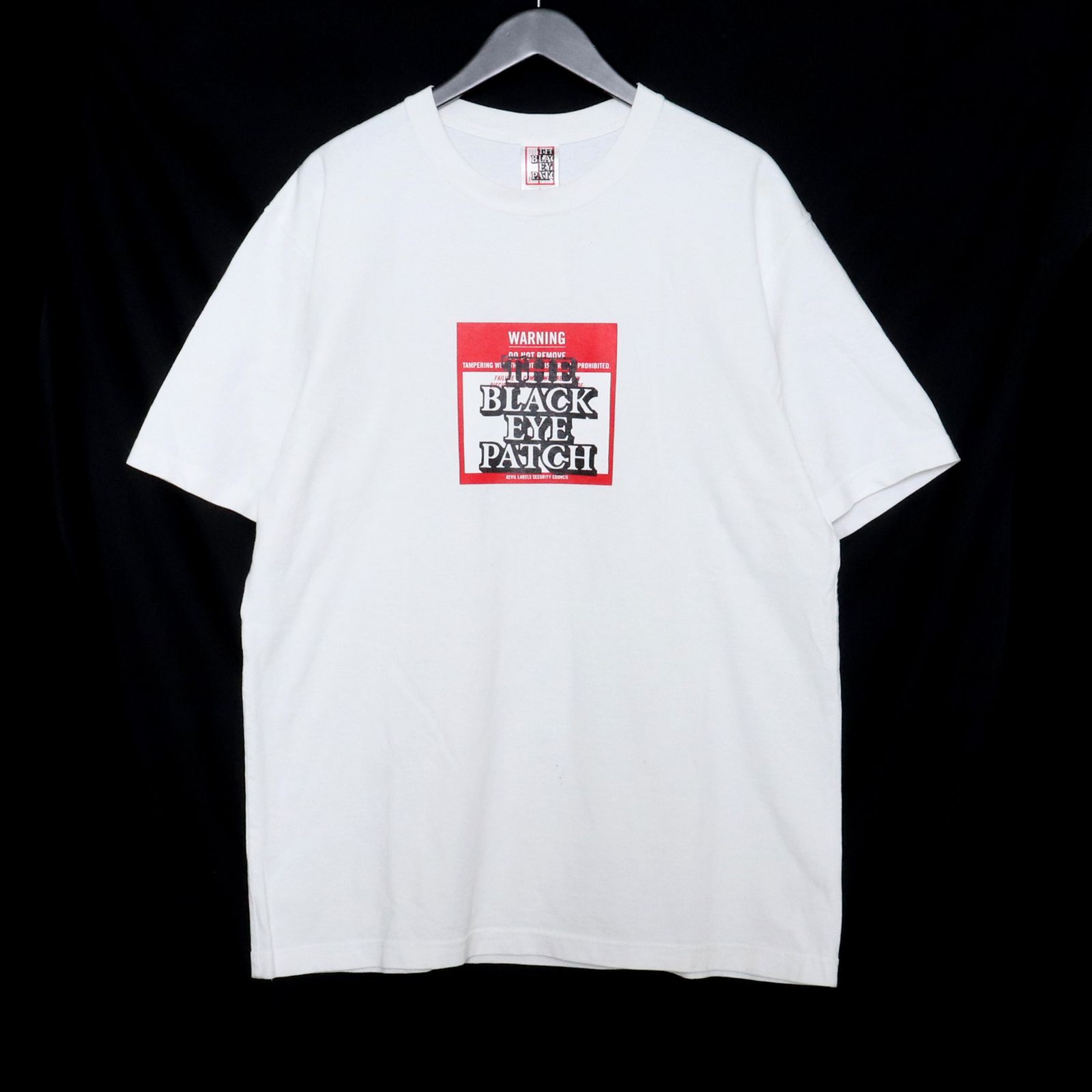 BLACK EYE PATCH WARNING TEE - メルカリ