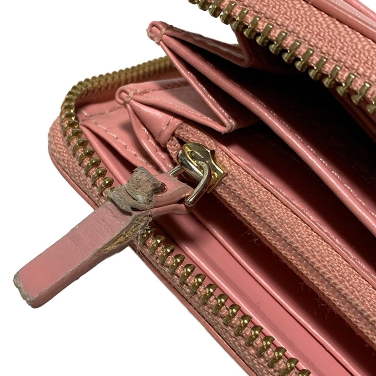 スタッズ ラウンドファスナー