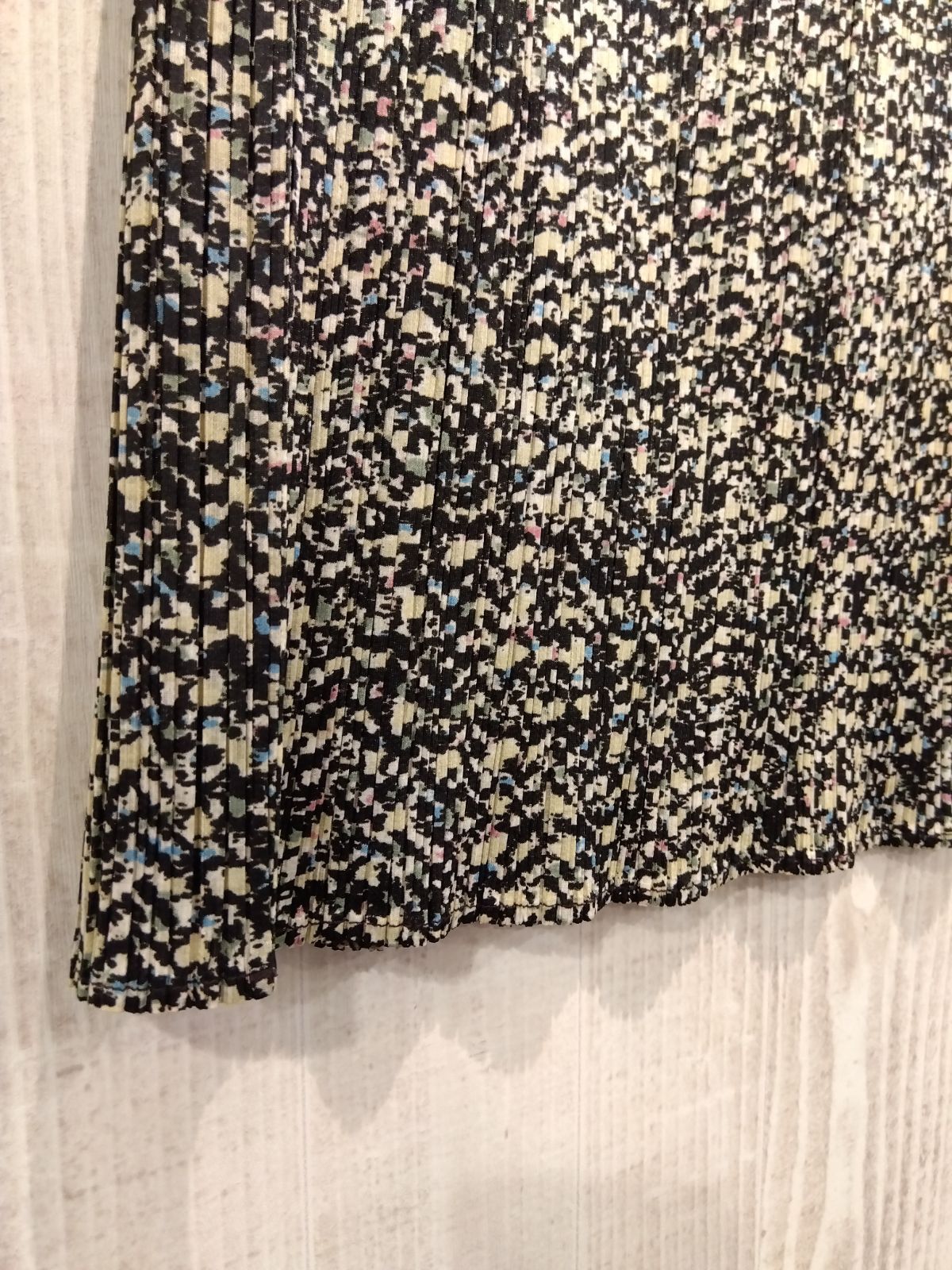 PLEATS PLEASE