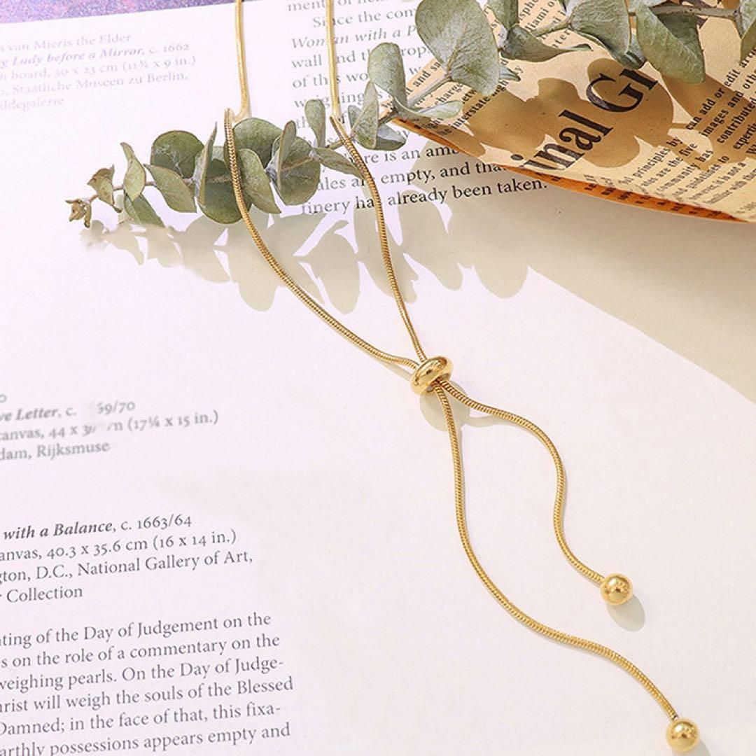 スライドボウタイロングネックレス ゴールド 金 ステンレス 金属