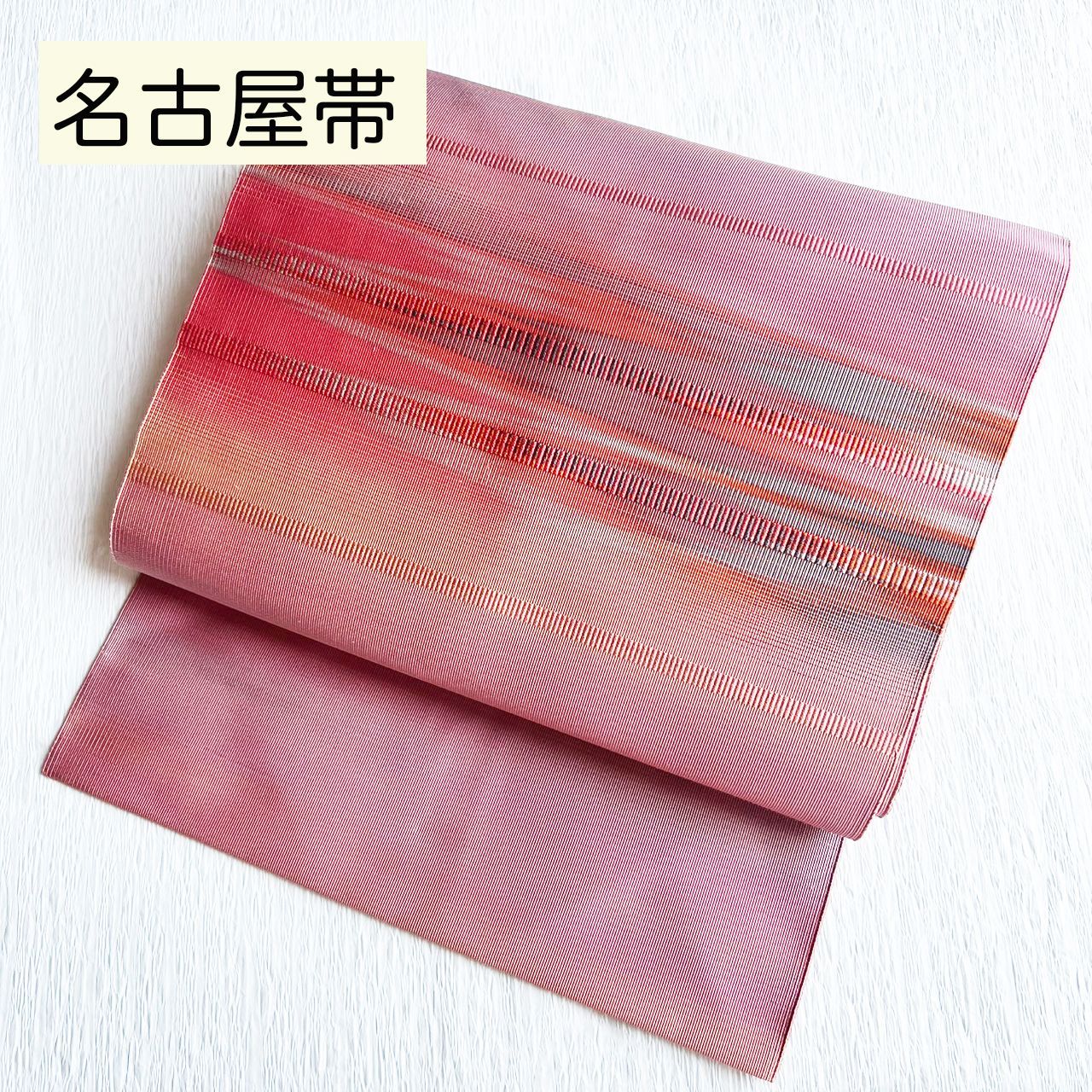 B141 名古屋帯 ピンク 赤 オレンジ 綴れ織風 - メルカリ