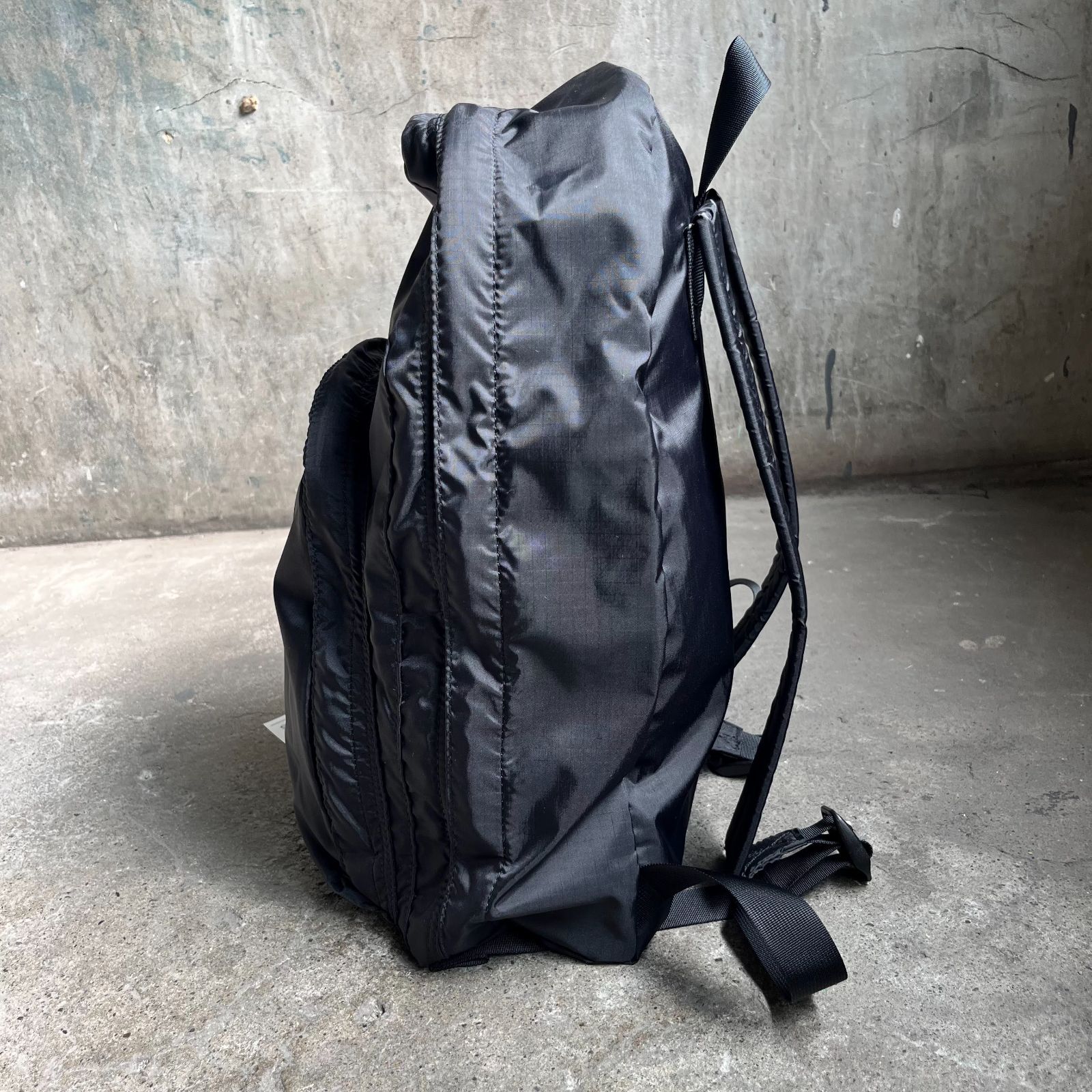 コムデギャルソン　リュックサック　ブラック　ロゴプリント　バックパック Black Comme Des Garçons ロゴタグ バックパック | ブラック