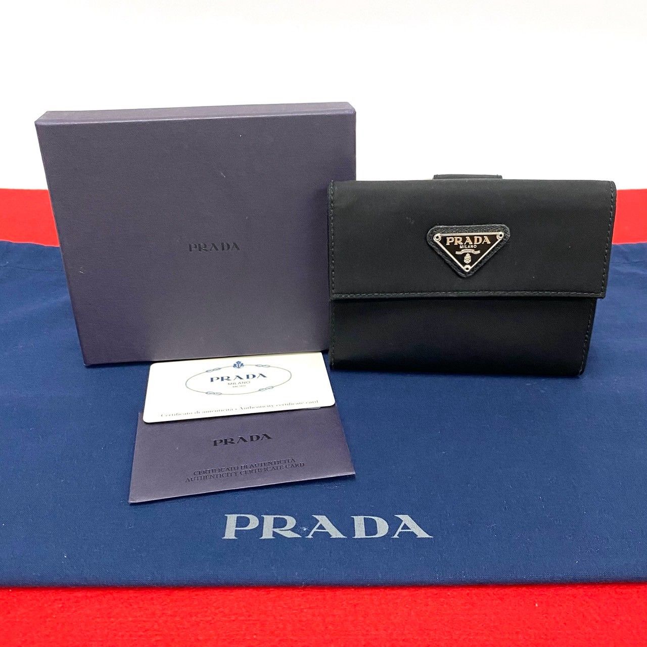 【箱付き】プラダ ナイロン 二つ折り コンパクト ウォレット 三角ロゴ PRADA - プラダ PRADA 財布 二つ折り 三角ロゴ レディース