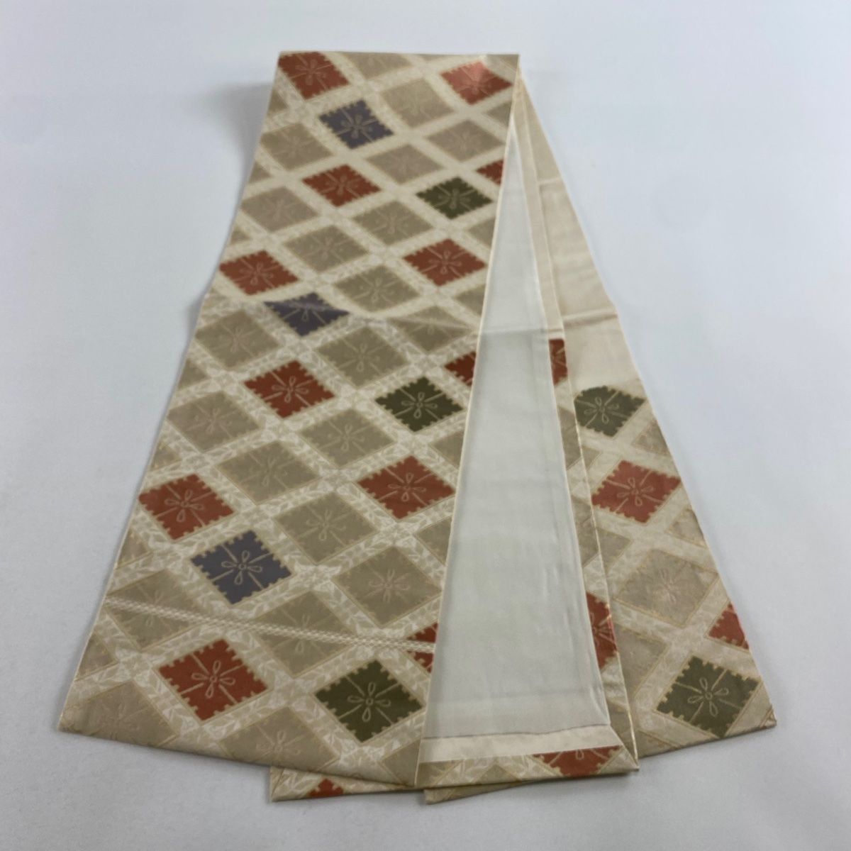 開き名古屋帯 美品 名品 菱 草花 箔 ベージュ 正絹 【中古