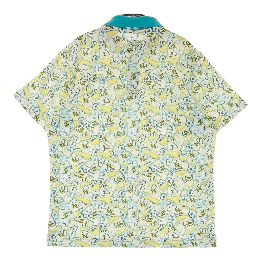 New Balance イエロー ポロシャツ 6