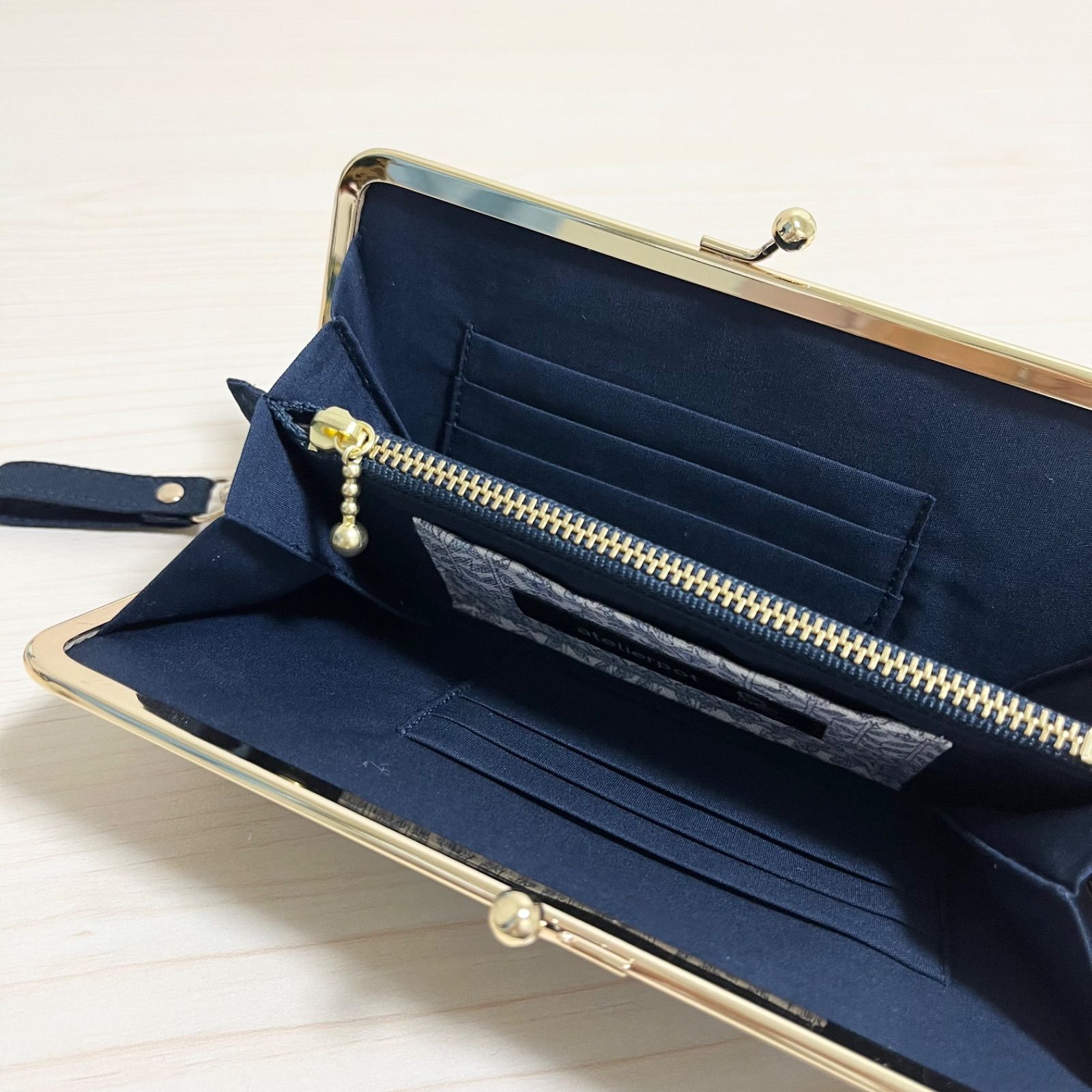 ミナペルホネンrosy navyのがま口財布持手付-税込