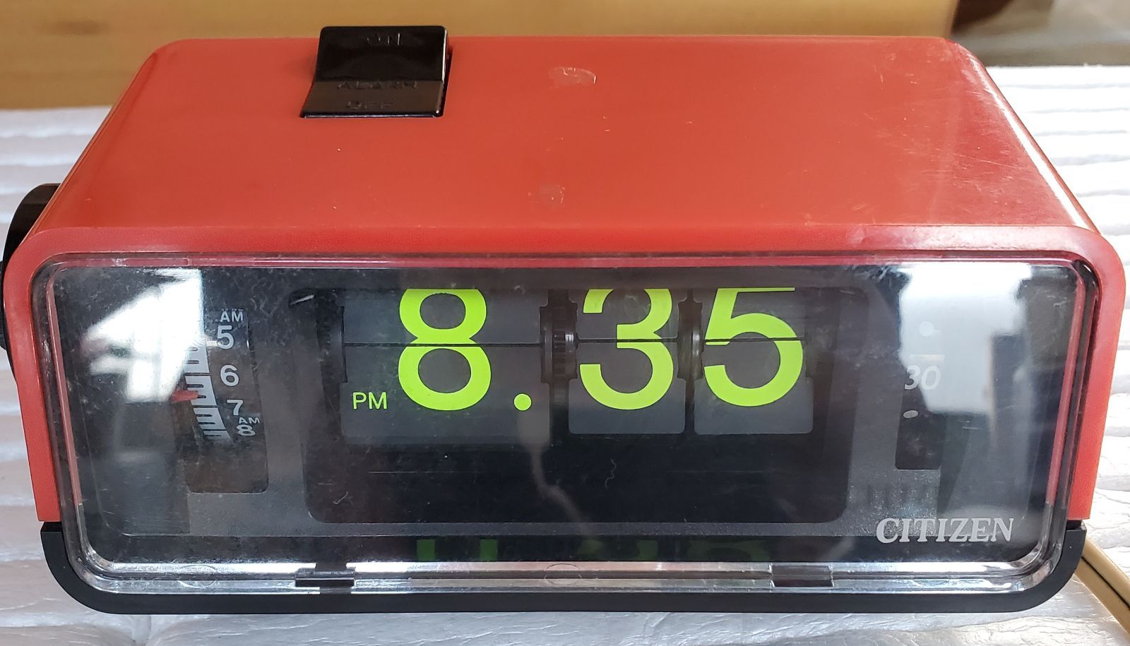 【未使用品】CITIZEN パタパタ時計　ネオカラー　オレンジ 置時計 未使用品】CITIZEN パタパタ時計ネオカラーオレンジ 置時計