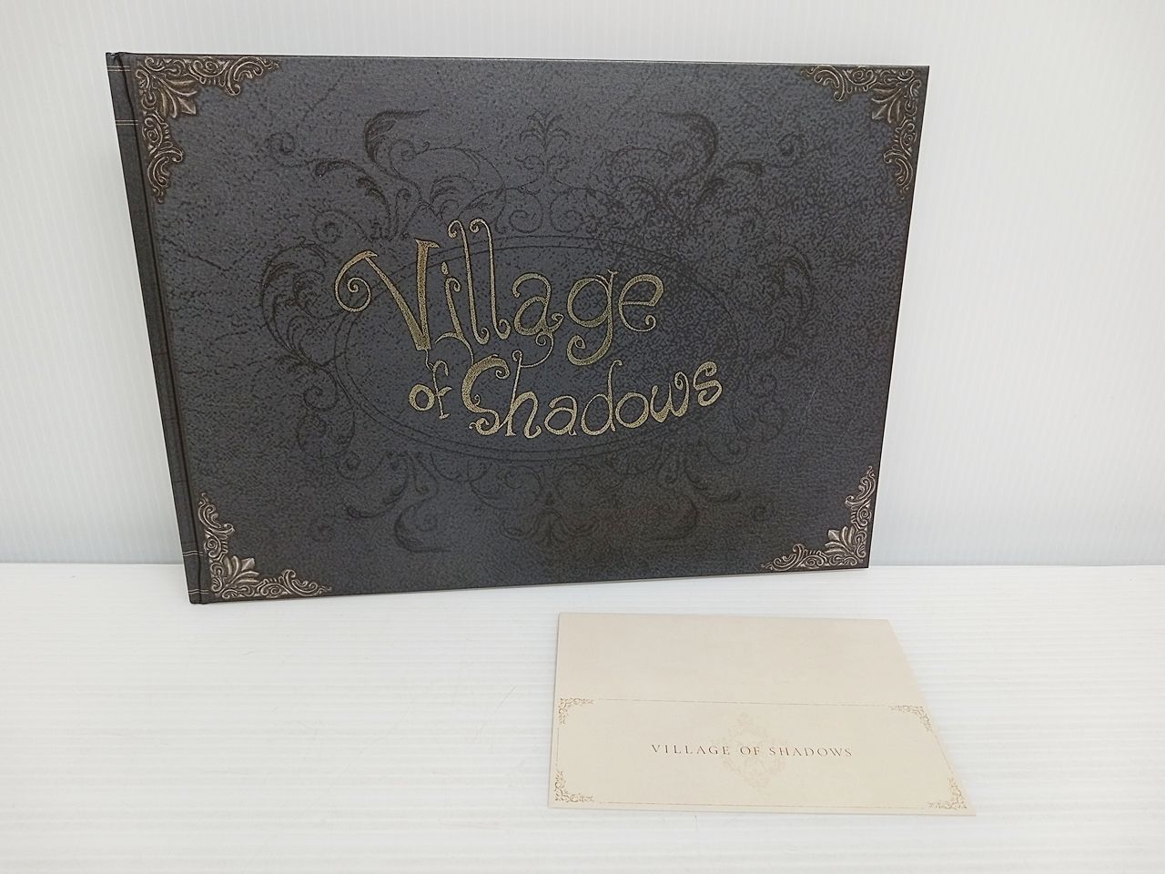 CAPCOM / カプコン バイオハザード ヴィレッジ Art book Village of Shadows アートブック 1534977 中古  [MB-1795] - メルカリ