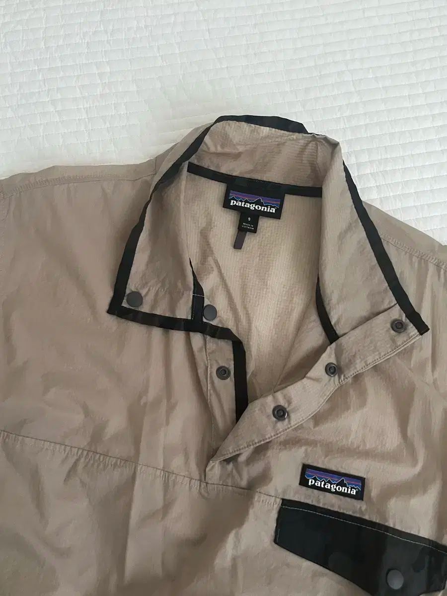 patagonia パタゴニア フーディーニ スナップティー ナイロン 所在