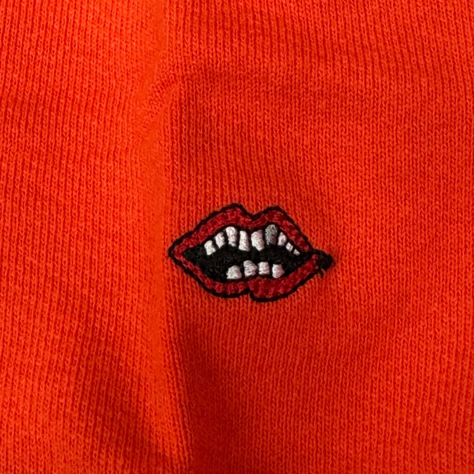 Sadistic Lipstick パーカー オレンジ