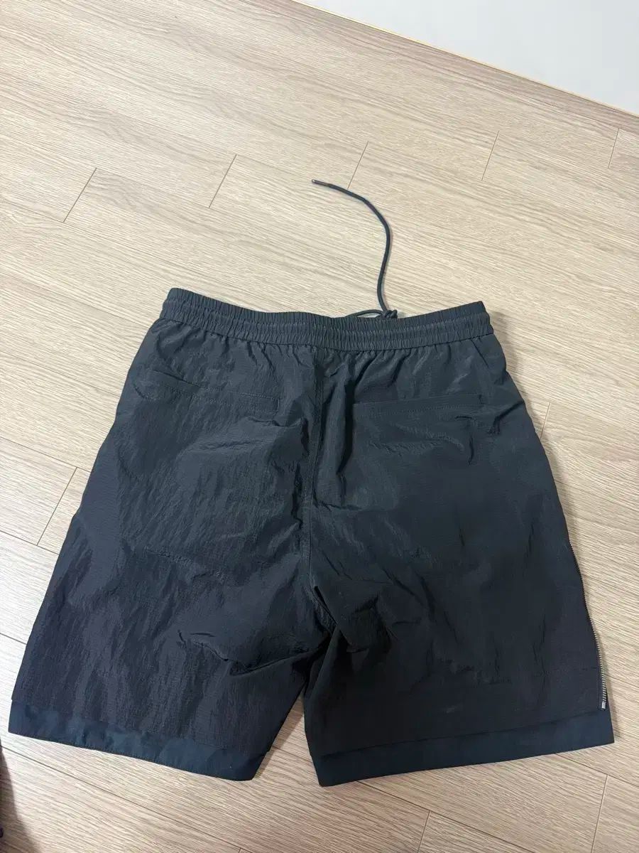 Juun.J(ジュンジェイ) サイド ジッパー ナイロン ハーフパンツ