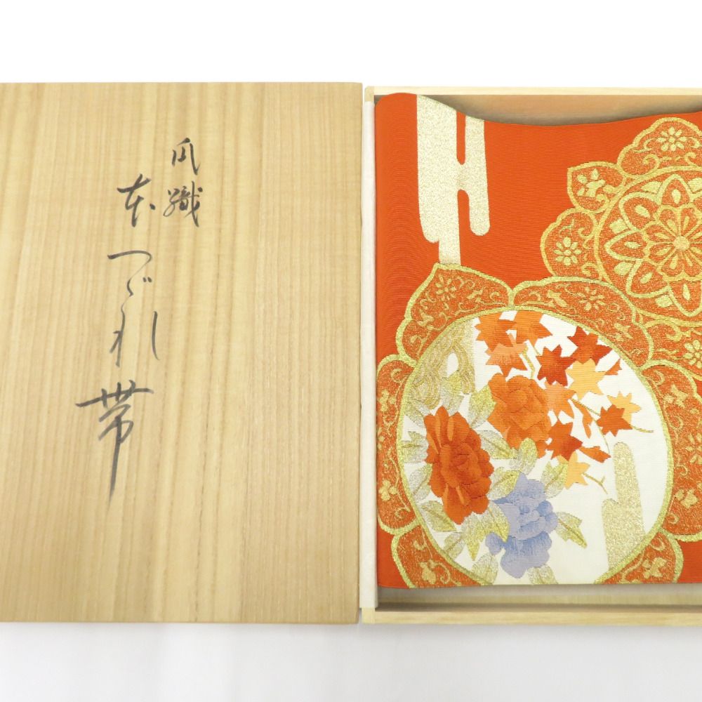 名古屋帯 本つづれ帯 朱地 金糸 華文紋様 お太鼓柄 正絹 桐箱入 つづれ
