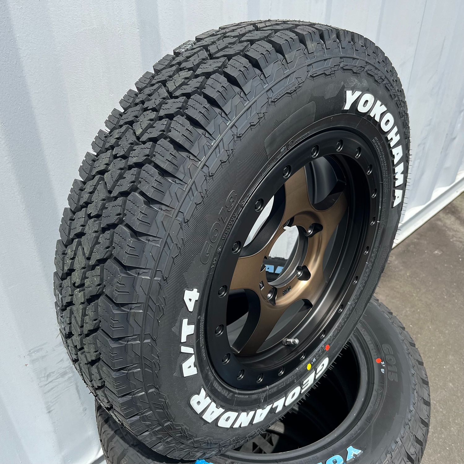 【ジムニータイヤホイール】JA11 JB23 JB64 16インチ 夏タイヤ ホイールセット BDX05 ヨコハマ YOKOHAMA ジオランダー AT4 185/85R16 ホワイトレター