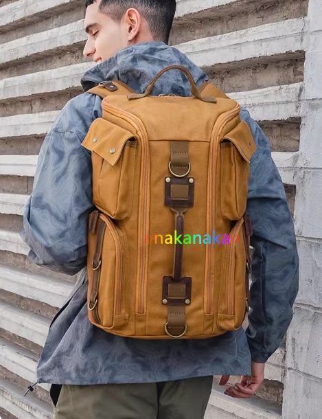 キャンバスレトロショルダーバッグ男性用アウトドアカジュアルリュック男女兼用防水大容量キャリーバッグパソコンリュック