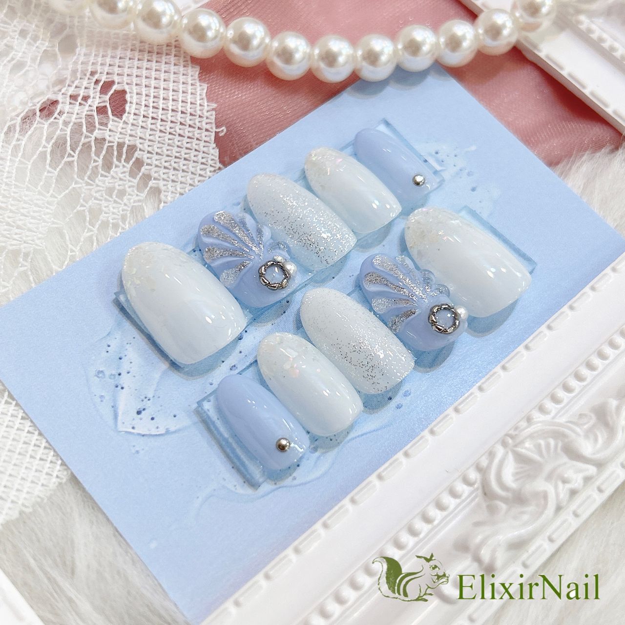 現品】ネイルチップ マーメイド 白 水色 - メルカリ