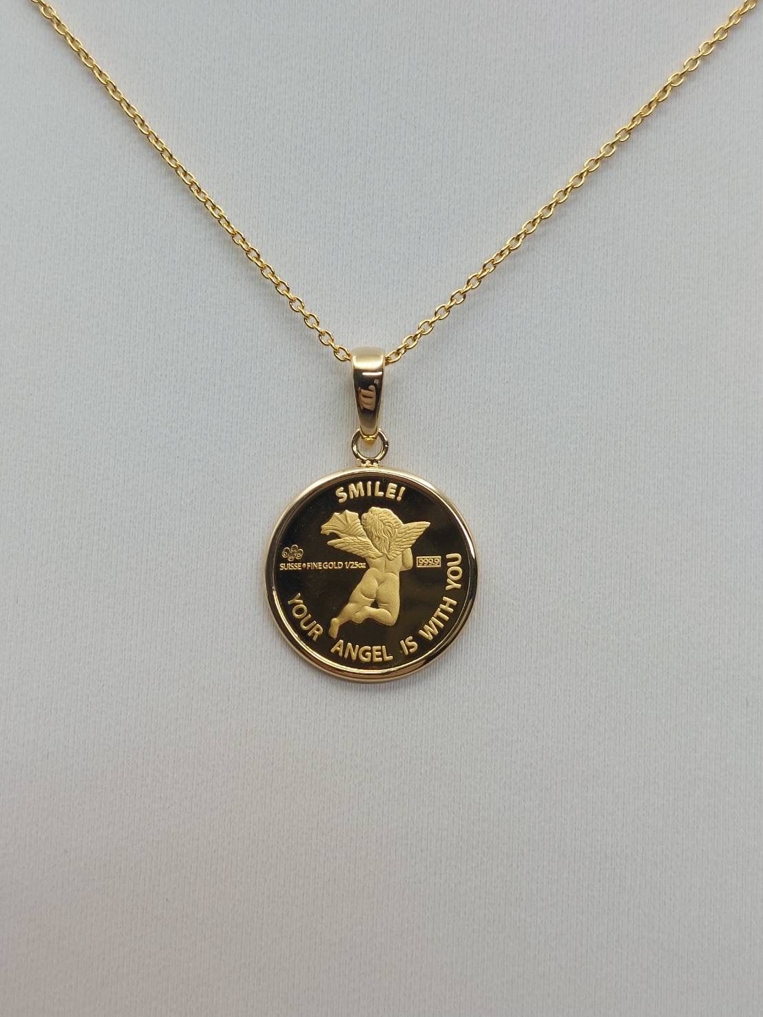 純金 18金 1 25 ozパンプ社製エンジェルコインペンダント