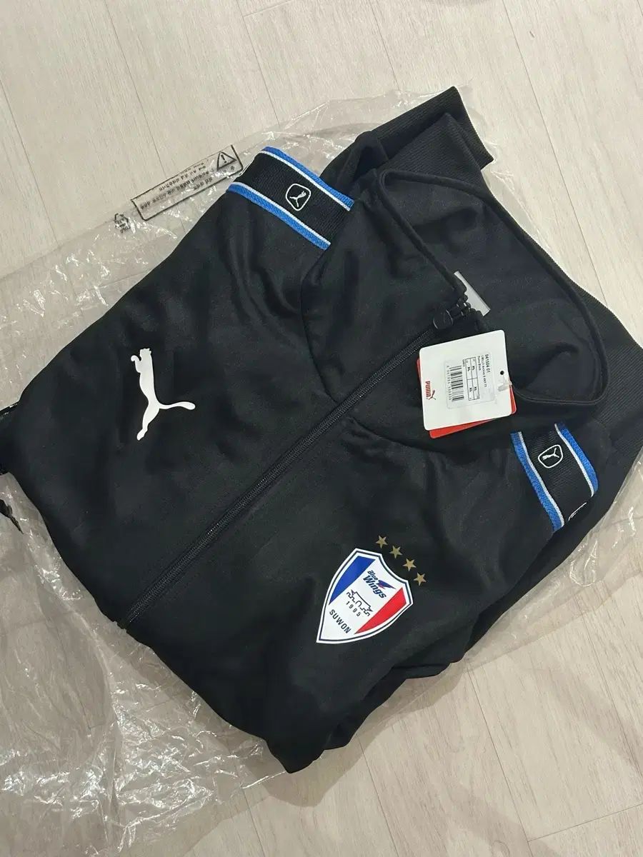 水原三星ブルーウィングス LIBILLY トラックジャージ xl