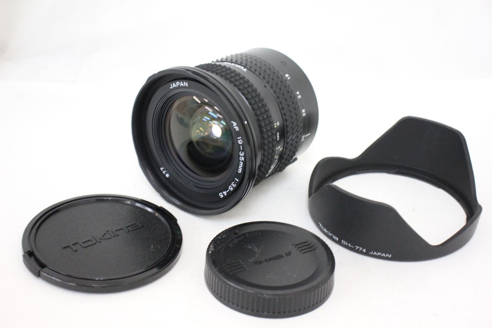 品 トキナー Tokina AF 19-35mm F3.5-4.5 キャノンマウント フード 前後キャップ付き レンズ e2323