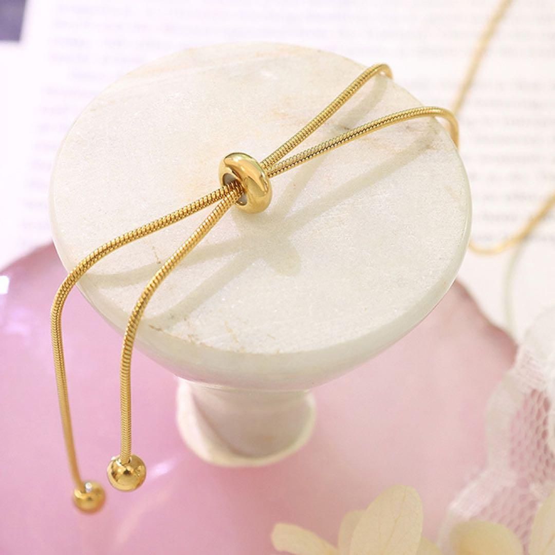 スライドボウタイロングネックレス ゴールド 金 ステンレス 金属