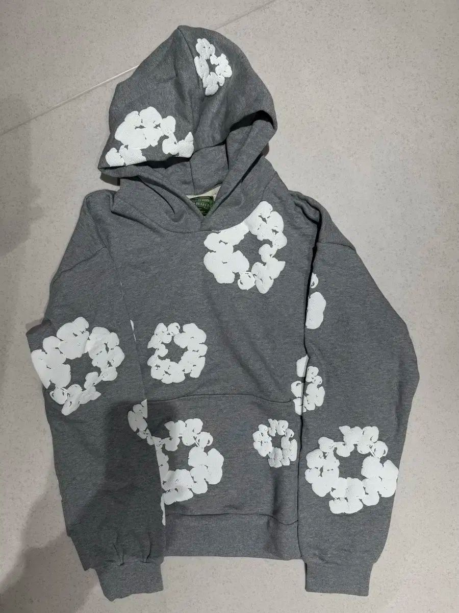 DENIM TEARS(デニムティアーズ) フード付きTシャツ