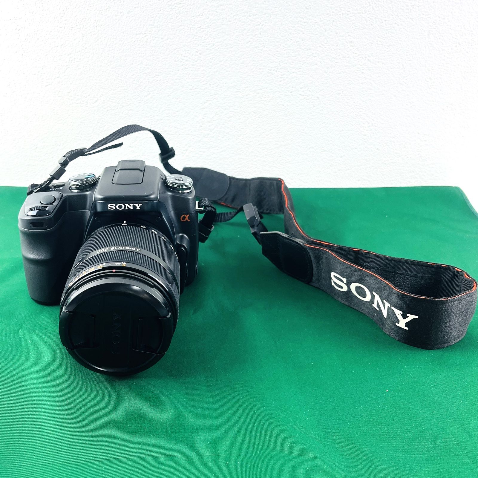 ◇【動作未確認／本体美品】ソニー デジタル一眼カメラ α100 アルファ100 DSLR-A100 ブラックボディ ハンドストラップ USBケーブル  αオレンジロゴ レンズキャップ レンズフード USBケーブル ケース SONY - メルカリ