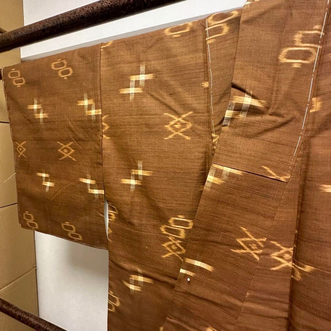 未使用 しつけ付 重要無形文化財 本場 久米島紬 着物 絣 沖縄 茶