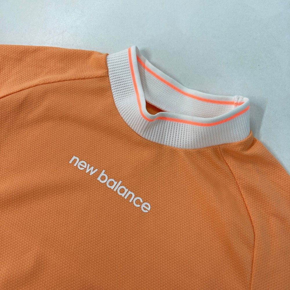 サイズ：2 NEW BALANCE GOLF ニューバランス 2022年モデル ハイネック 半袖Tシャツ サイドロゴ オレンジ系 [240101281844] ゴルフウェア レディース ストスト NEW BALANCE GOLF ニューバランス 2022年モデル ハイネック 半袖