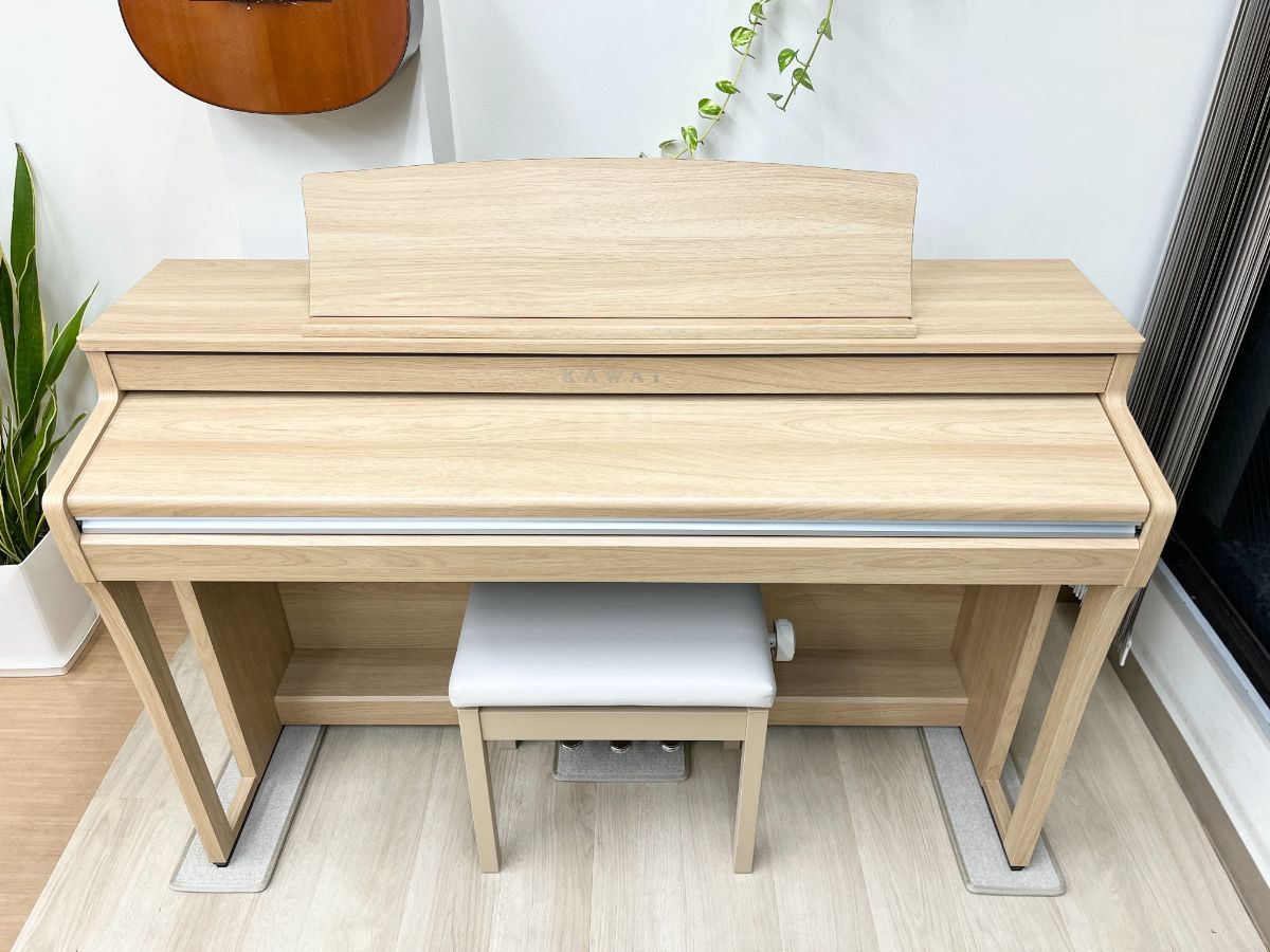 電子ピアノ専門店の配送設置込