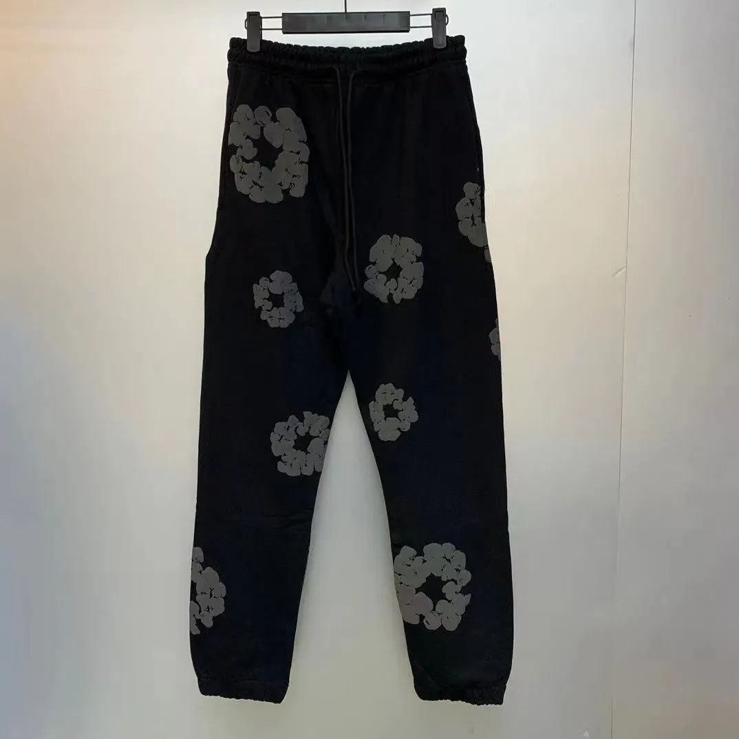 人気爆発 Denim Tearsデニムティアーズ 大きい花柄プリント モノ レース スウェットパンツ ユニセックス セットアップ可