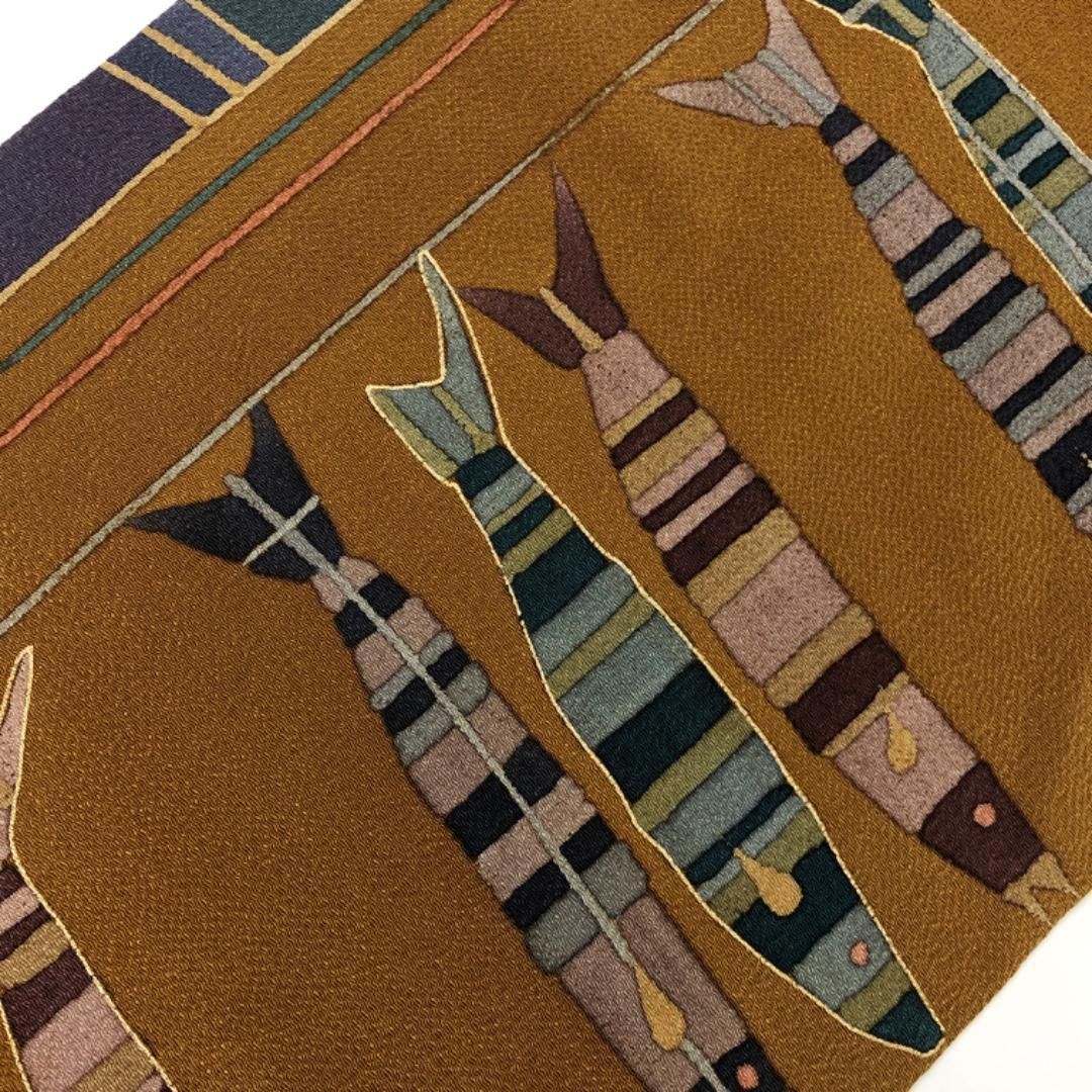 名古屋帯 魚 縦縞模様 縮緬 金彩 蜜柑茶色 ガード加工 O-5506