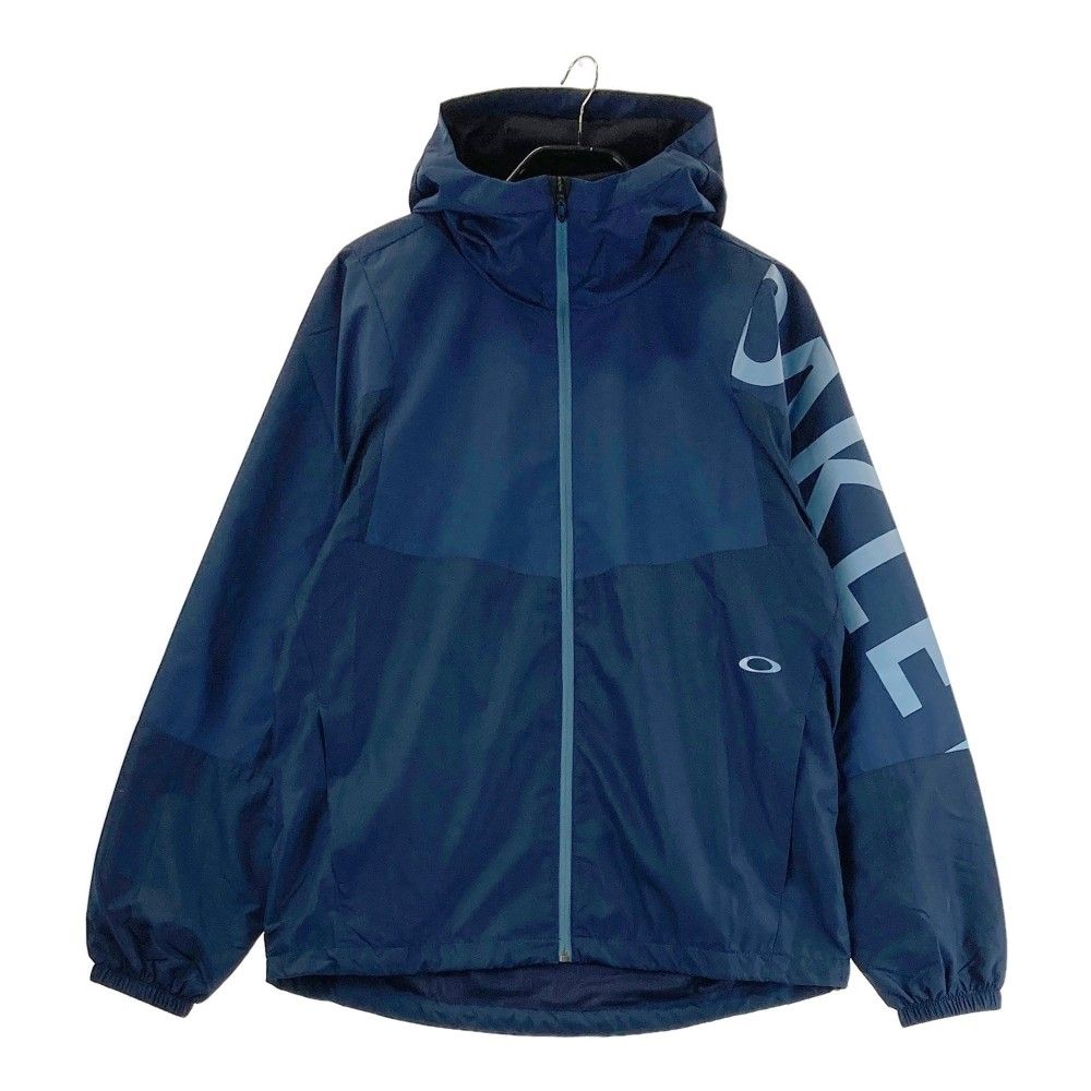 サイズ：L OAKLEY オークリー FOA406887 ジップジャケット  ネイビー系 [240101460583] ゴルフウェア メンズ ストスト サイズ：L OAKLEY オークリー FOA406887 ジップジャケット