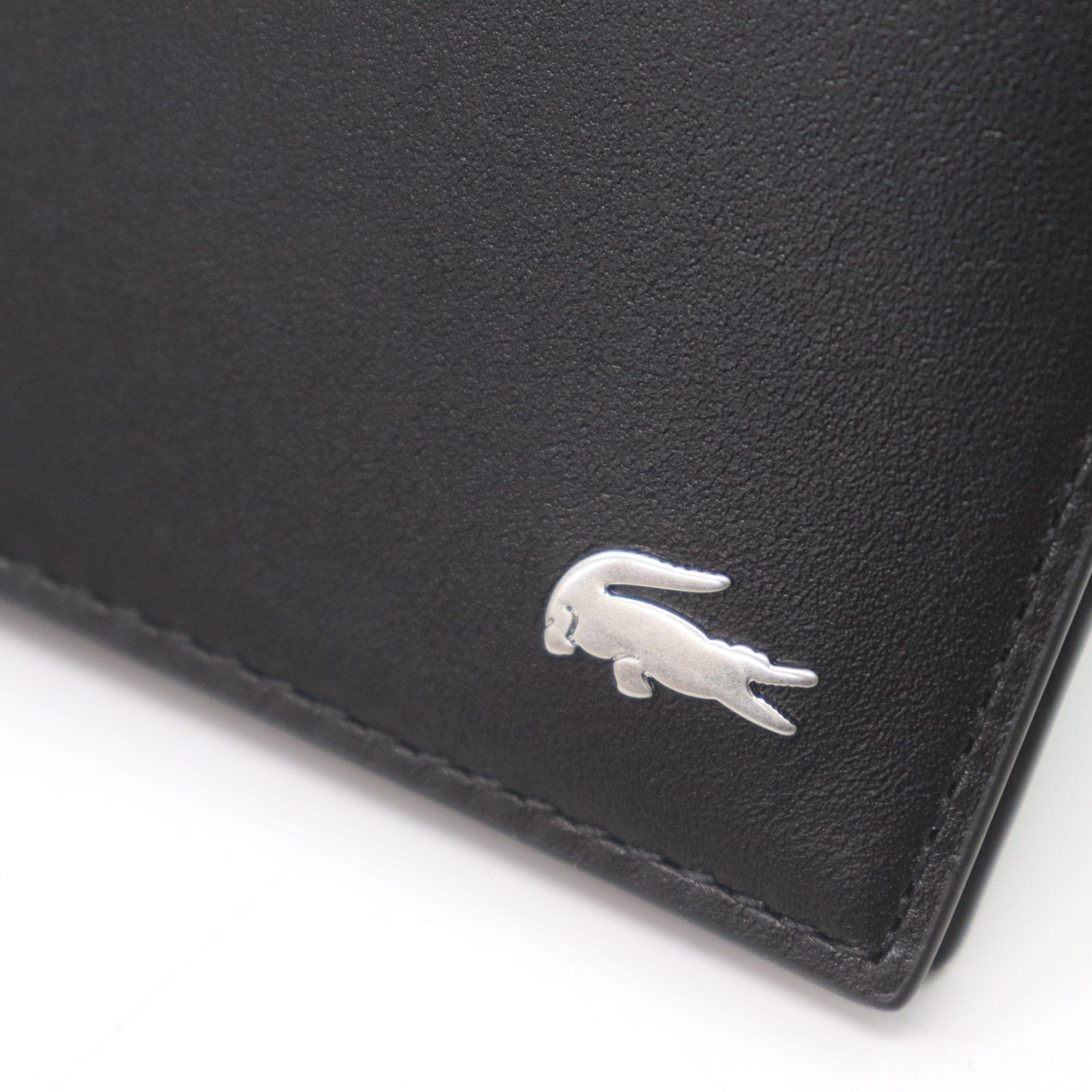 IT7YALCUWJAW 未使用 LACOSTE ラコステ レザー 二つ折り財布 さいふ NH1407FG お財布 小銭入れなし カード入れ 黒 ブラック マーク ロゴ ワニ メンズ レディース