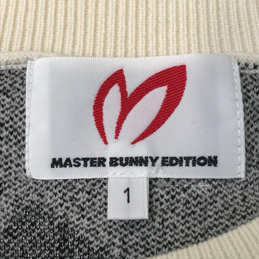 サイズ：1 MASTER BUNNY EDITION マスターバニーエディション 2023年モデル ウール混 ニットセーター ロゴ 総柄 ホワイト系 [240101364814] ゴルフウェア レディース ストスト MASTER BUNNY EDITION マスターバニーエディション ニット
