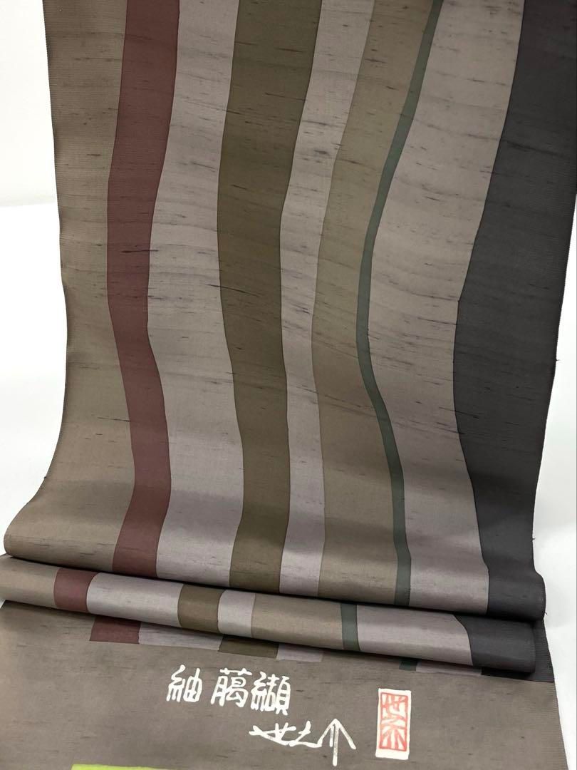 本場大島紬 本泥染 吉三郎 7マルキ 通産大臣指定伝統的工芸品 正絹 反物 ブラックフライデーセール】 【吉織物 吉三郎】 本場大島紬 割込式絣