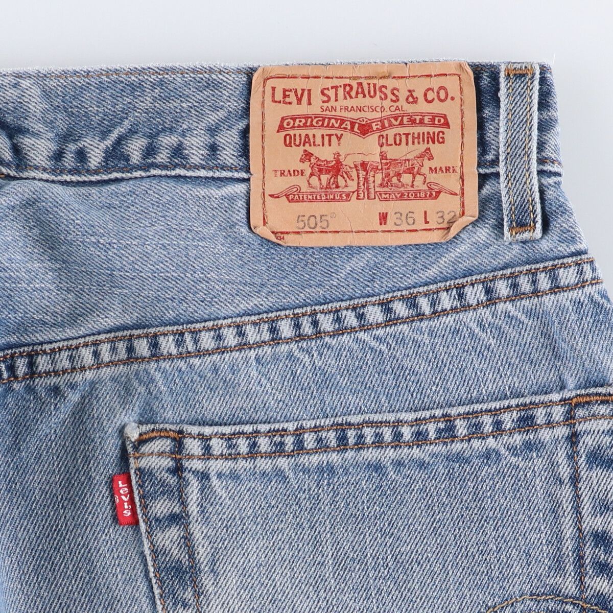 FIT テーパードデニムパンツ