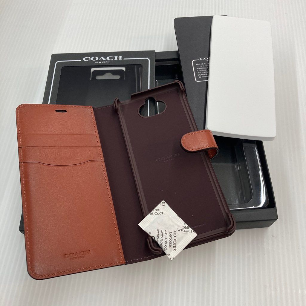 ○未使用○【Xperia 8用】 COACH ブックタイプケース／SIGNATURE Brown RS9C082T - メルカリ