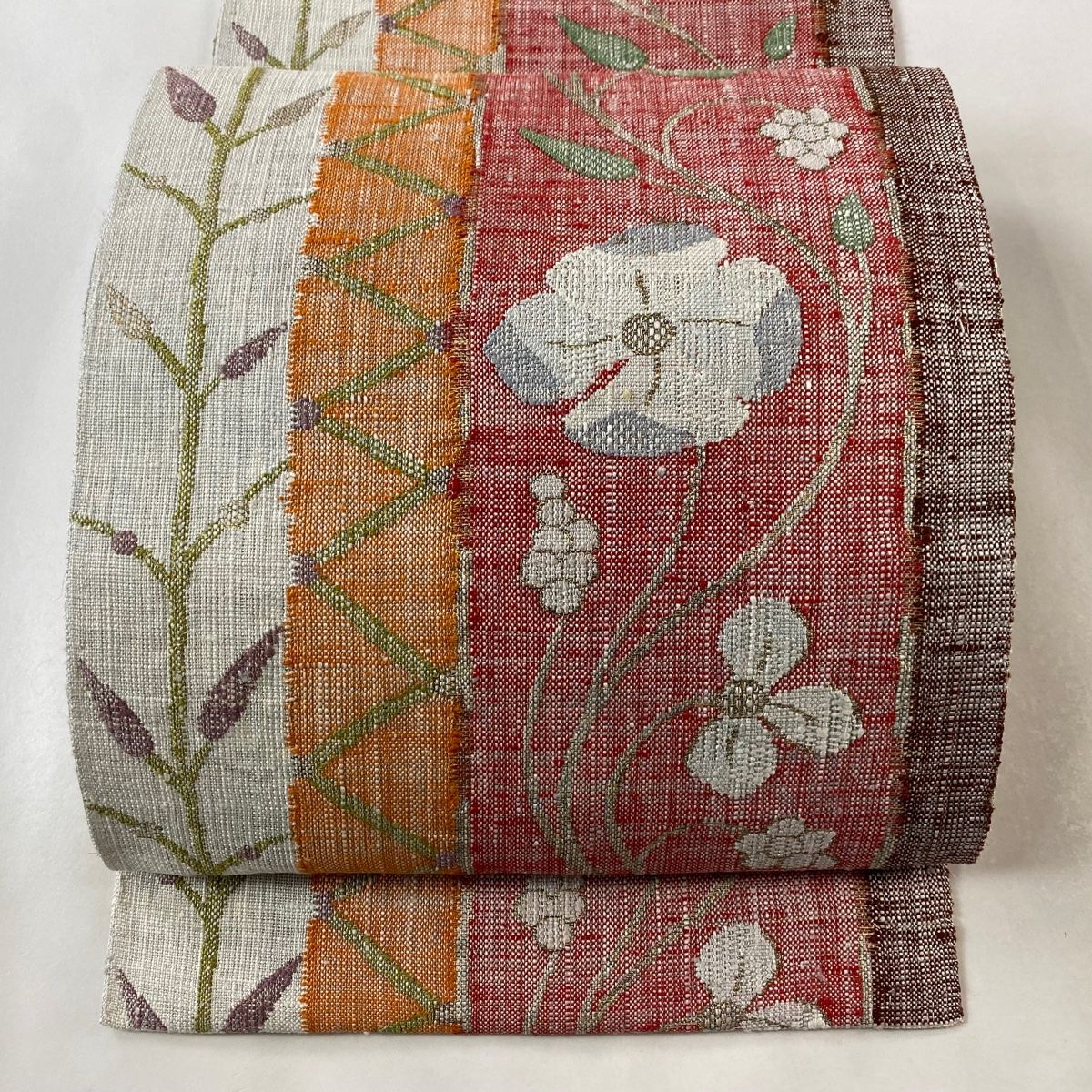 名古屋帯 秀品 八寸名古屋帯 松葉仕立て 草花 葉 金銀糸 箔 灰白 正絹