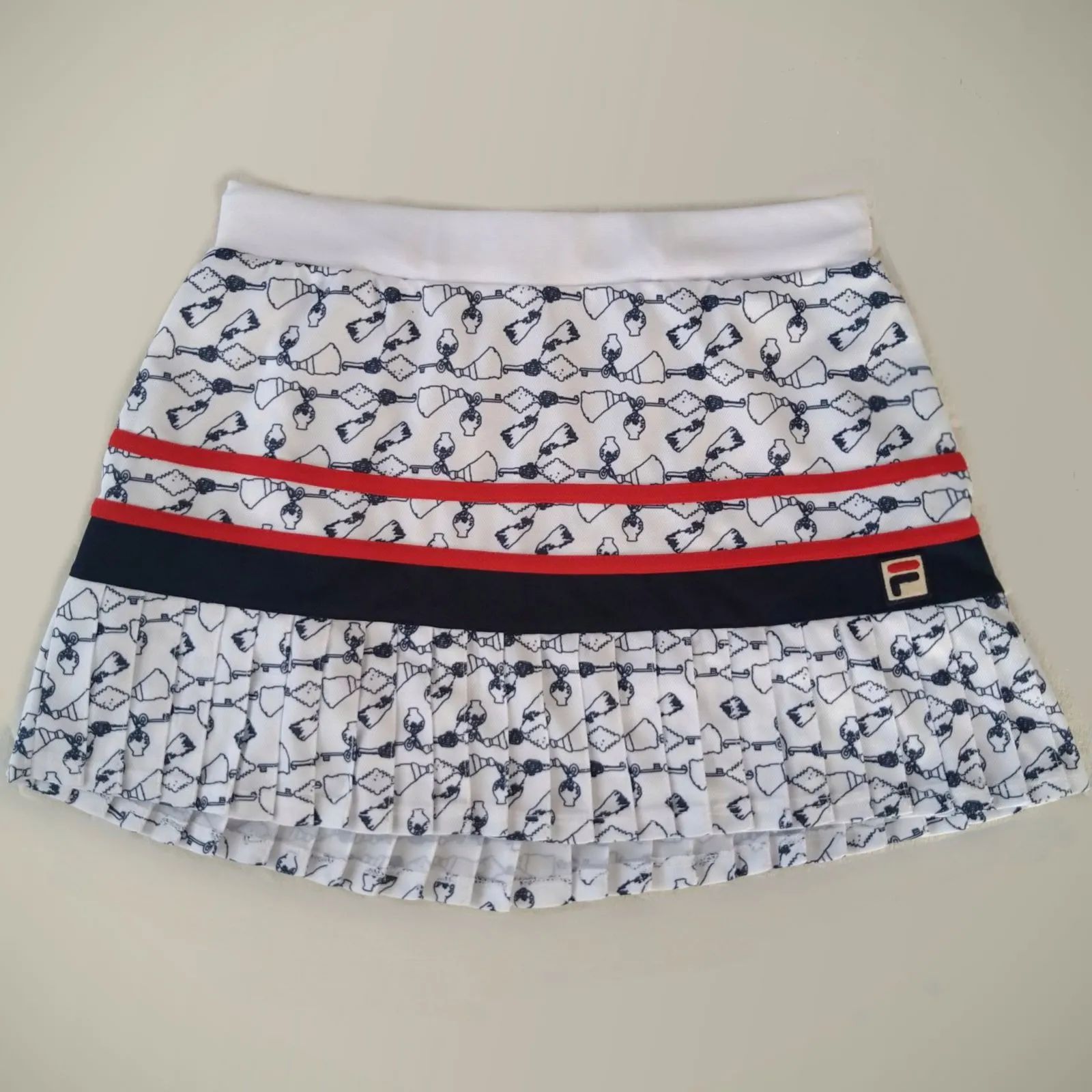 FILA フィラ テニス プリーツスコート Mサイズ 美品 白 - メルカリ