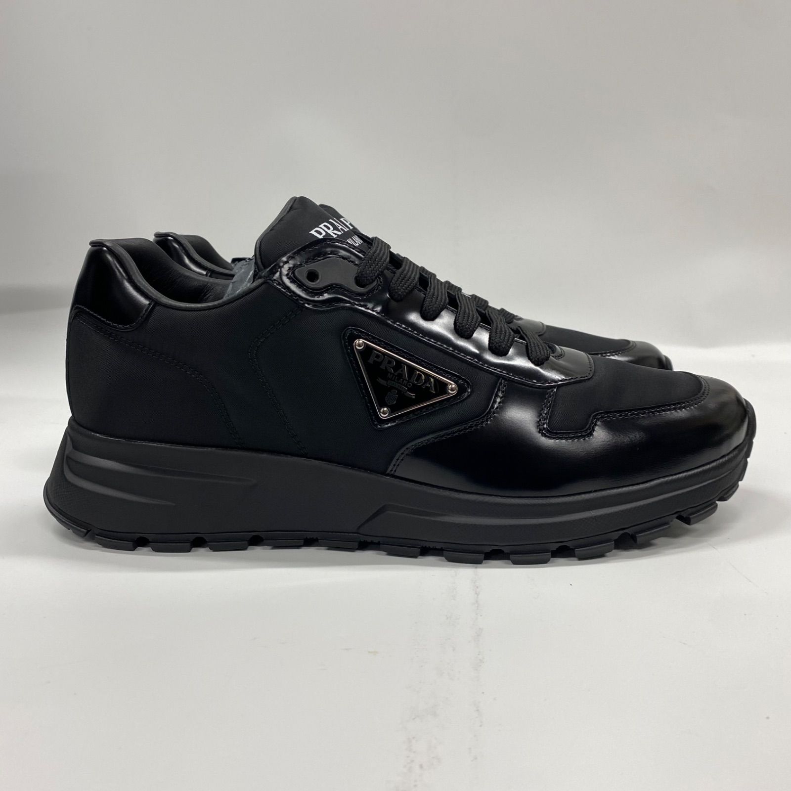 PRADA】プラダRe-Nylon xブラッシュドレザー メンズ スニーカー BLACK 