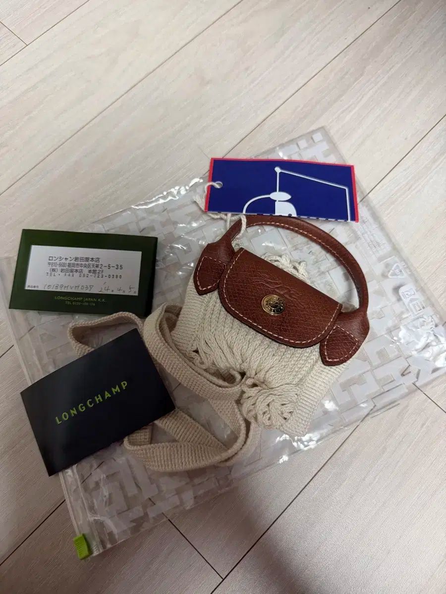 Longchamp ロンシャン または ル プリアージュ ミニ トップハンドル 販売