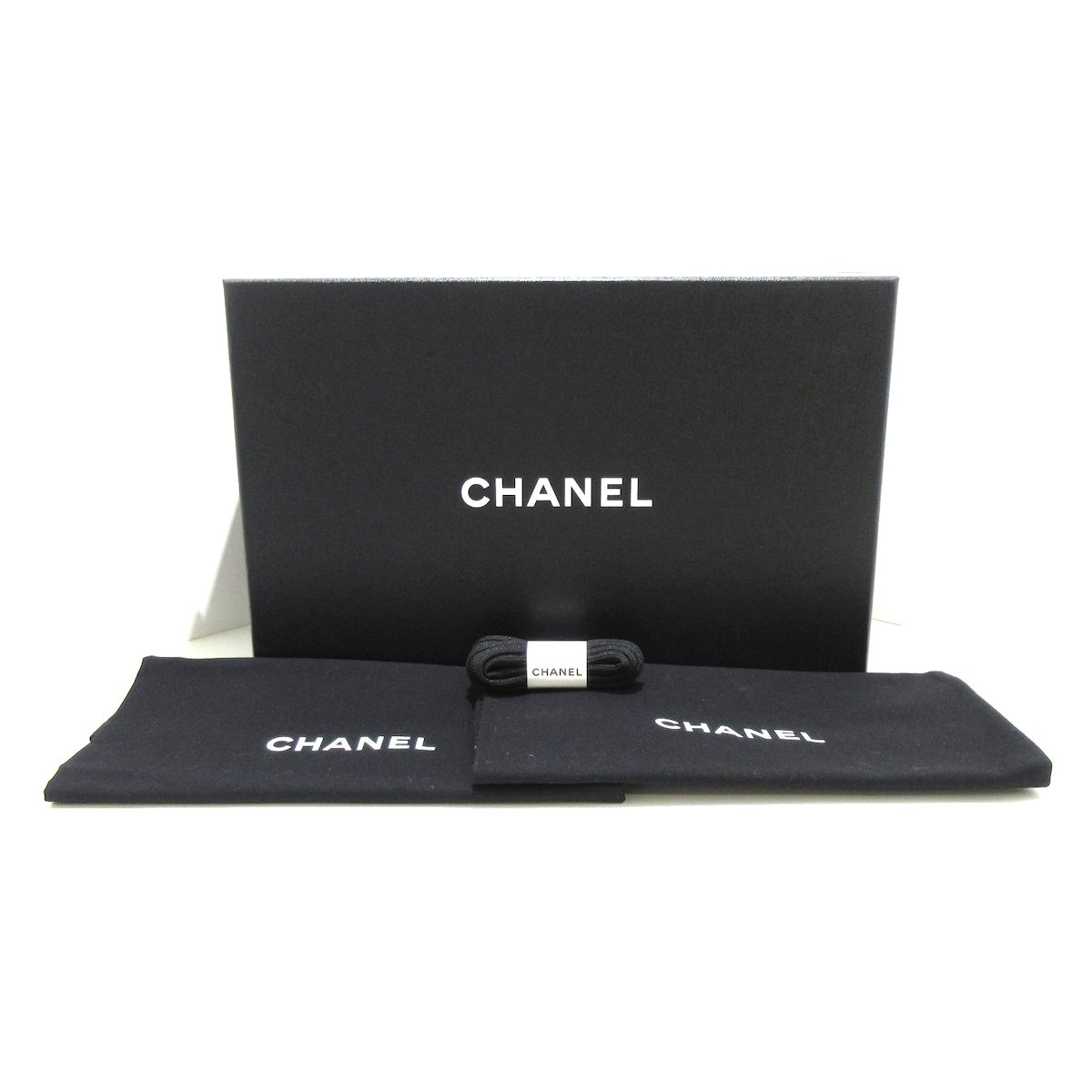 CHANEL(シャネル) スニーカー 37 レディース - G39070 黒×白 ココ ...