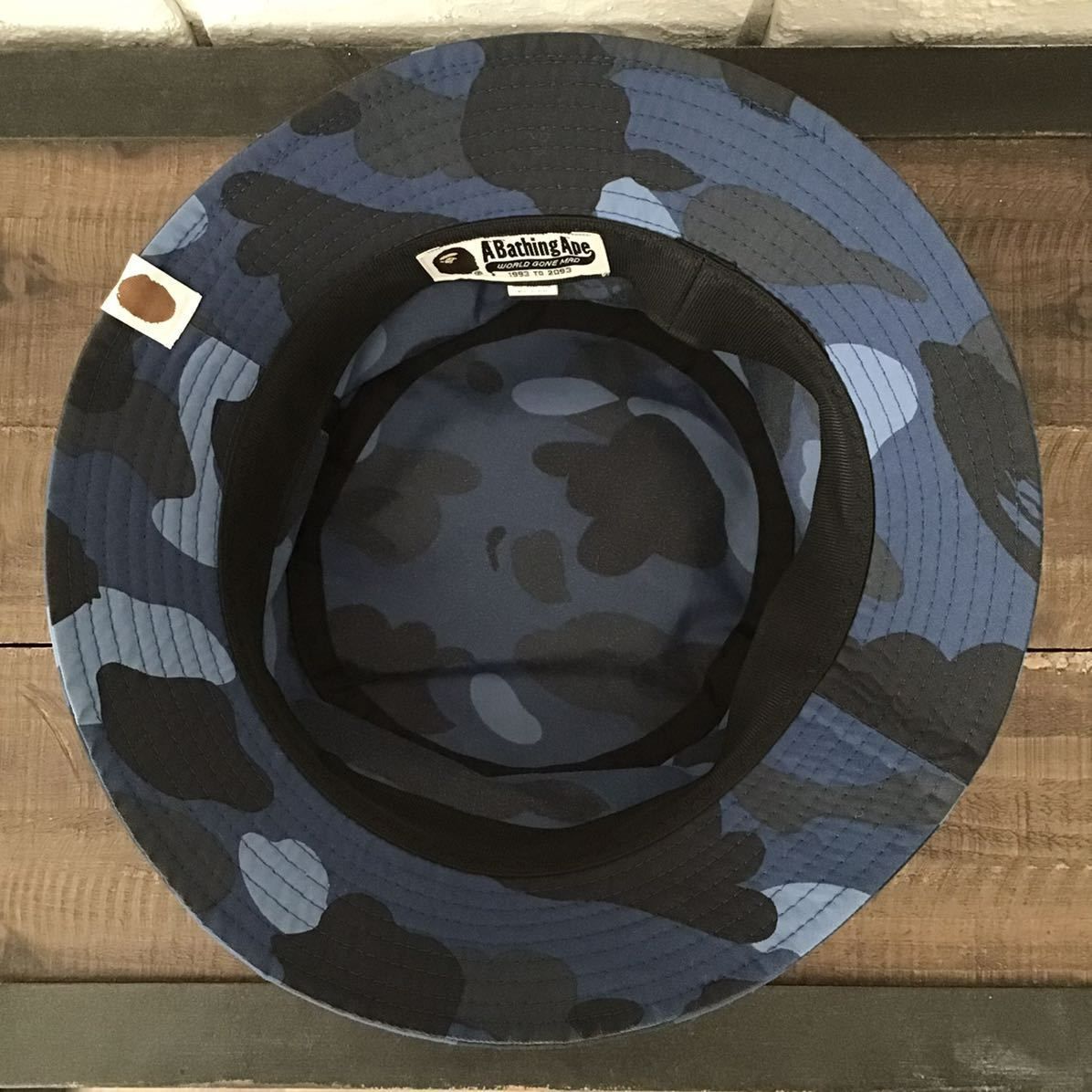 A BATHING APE® OFFICIAL - 1ST CAMO SHARK BUCKET HAT BAPE