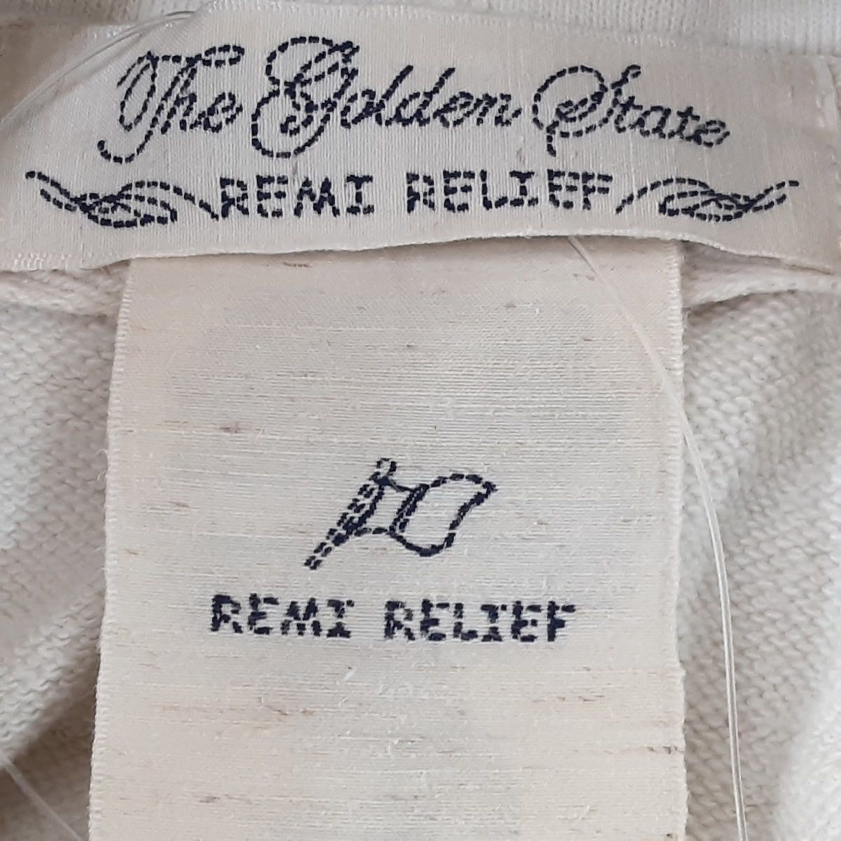 REMI RELIEF(レミ レリーフ) パーカー サイズS レディース - アイボリー×ネイビー 長袖/刺繍/ダメージ加工