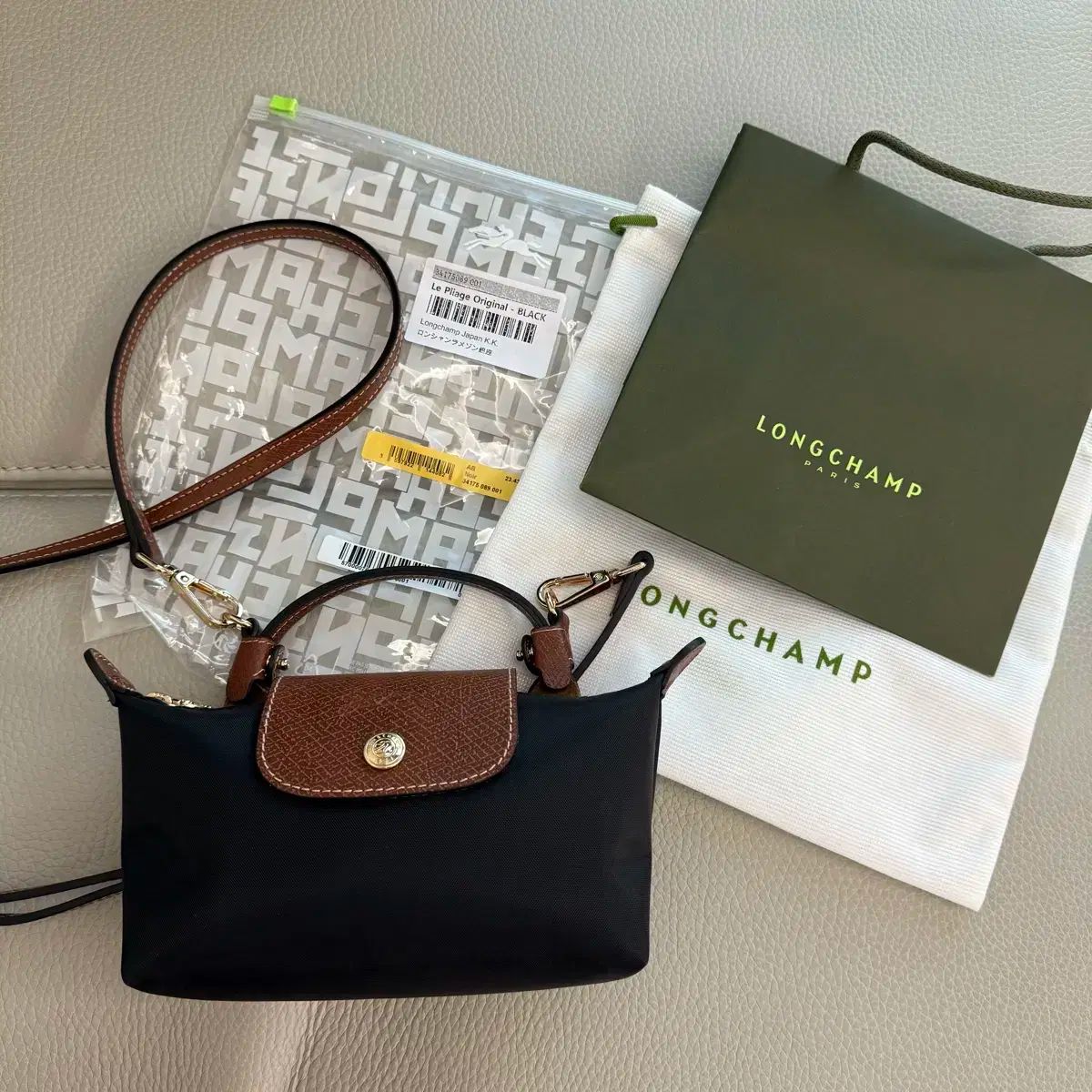 Longchamp ロンシャン または ル プリアージュ ブラック ミニバッグ