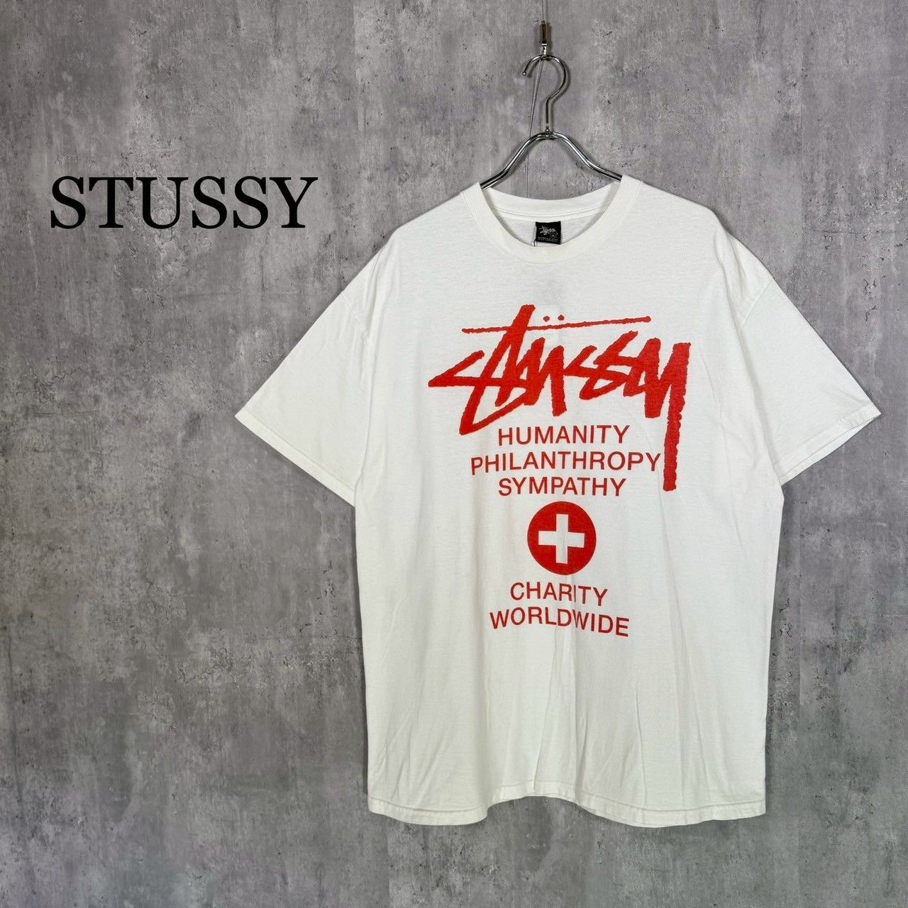 ՏTUSSY』ステューシー (XL) チャリティーワールドTシャツ - メルカリ
