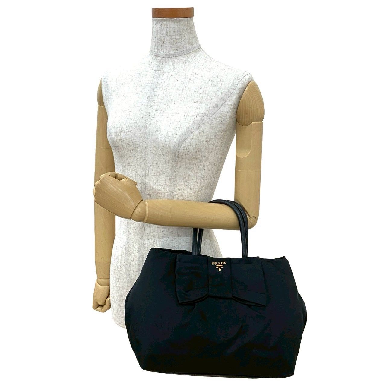 PRADA プラダ ロゴ 金具 リボン モチーフ テスート ナイロン レザー 本革 ハンドバッグ ミニ トートバッグ ブラック 63258