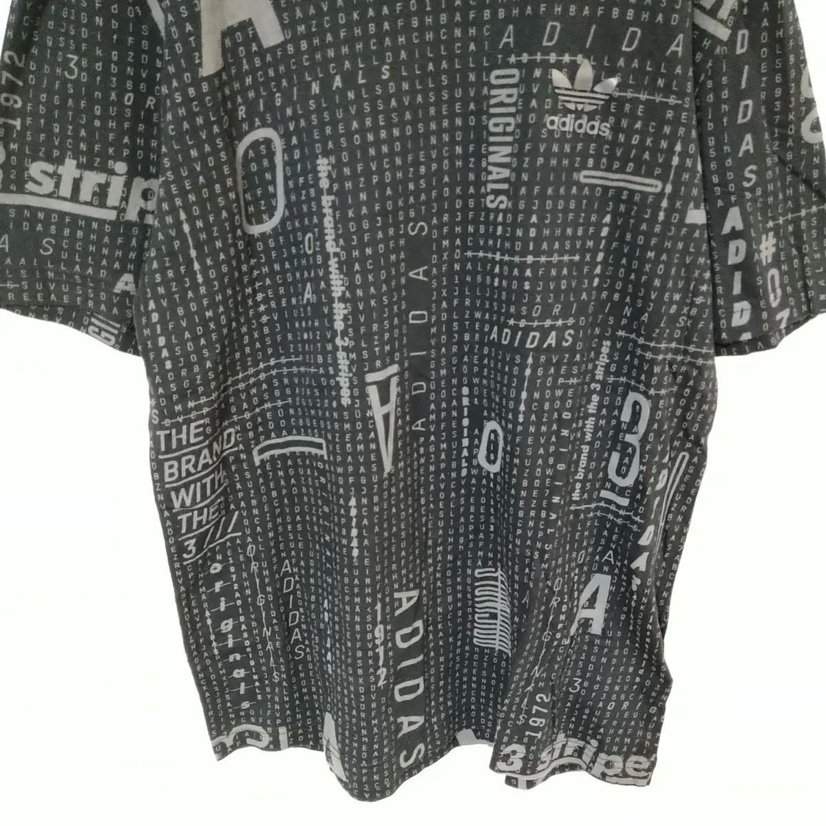 アディダス adidas Tシャツ メンズM 黒色 アディダス柄 ロゴ入 綿